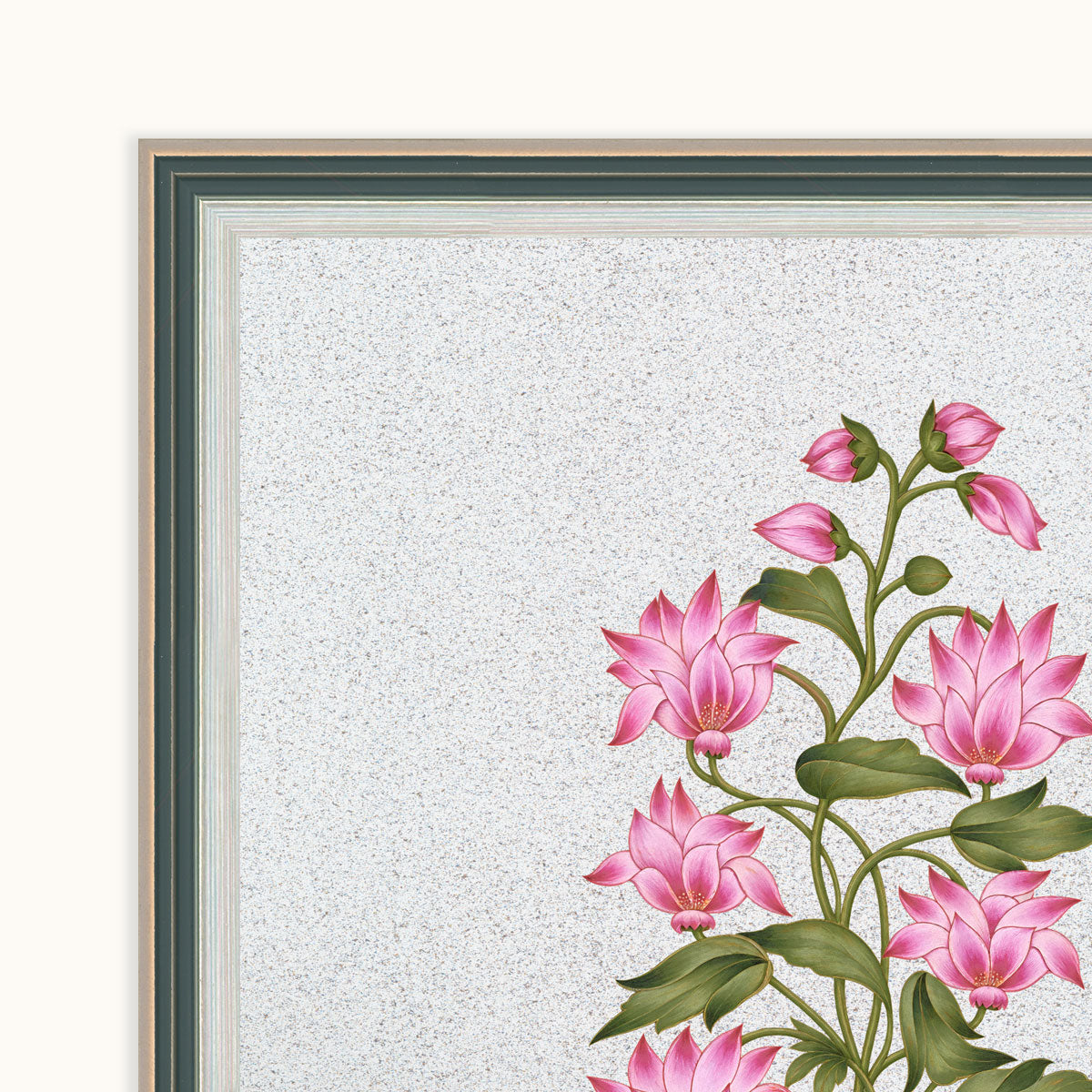 Close-up of the layered dark green, silver and gold-toned frame surrounding the botanical artwork