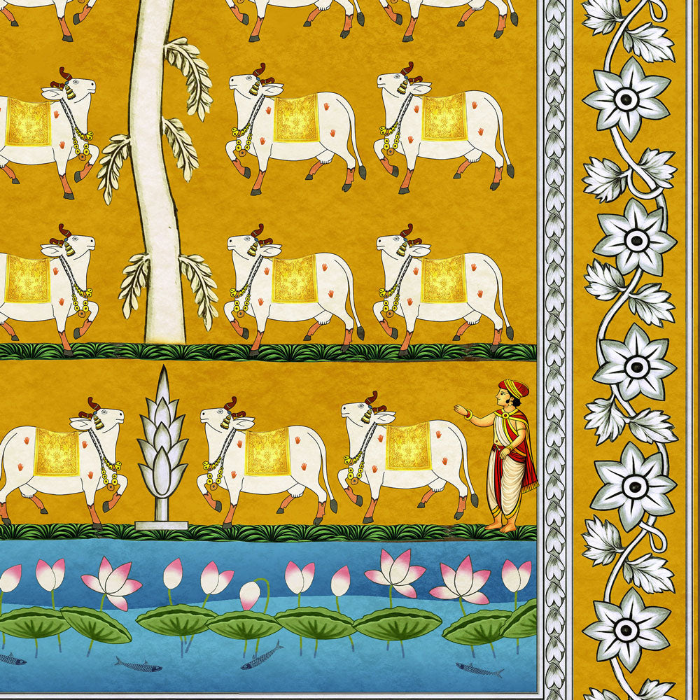 A close-up of a traditional Indian textile or wallpaper pattern featuring white cows with yellow saddles on a mustard yellow background, a vertical floral border on the right, and a blue lotus pond scene along the bottom.