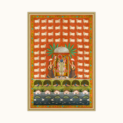 A framed Indian folk art print depicting Lord Krishna and the Gopichar, featuring a vibrant orange background with repeating white script, a central deity under a green palm tree, and a lotus pond at the bottom, all enclosed in a gold frame.