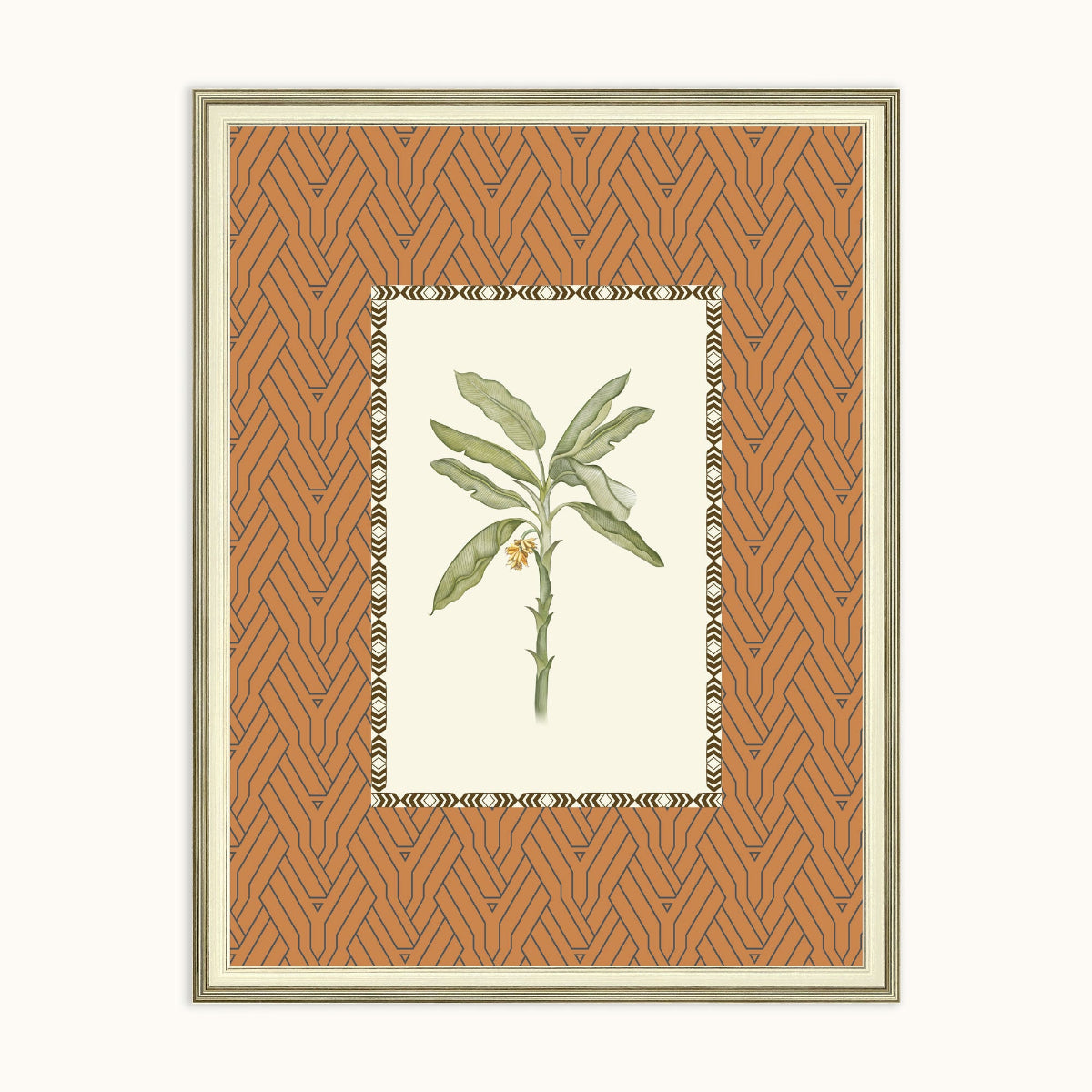 A framed botanical art frame featuring a green leafy plant with a small yellow flower, set against a patterned terracotta background with a cream border.