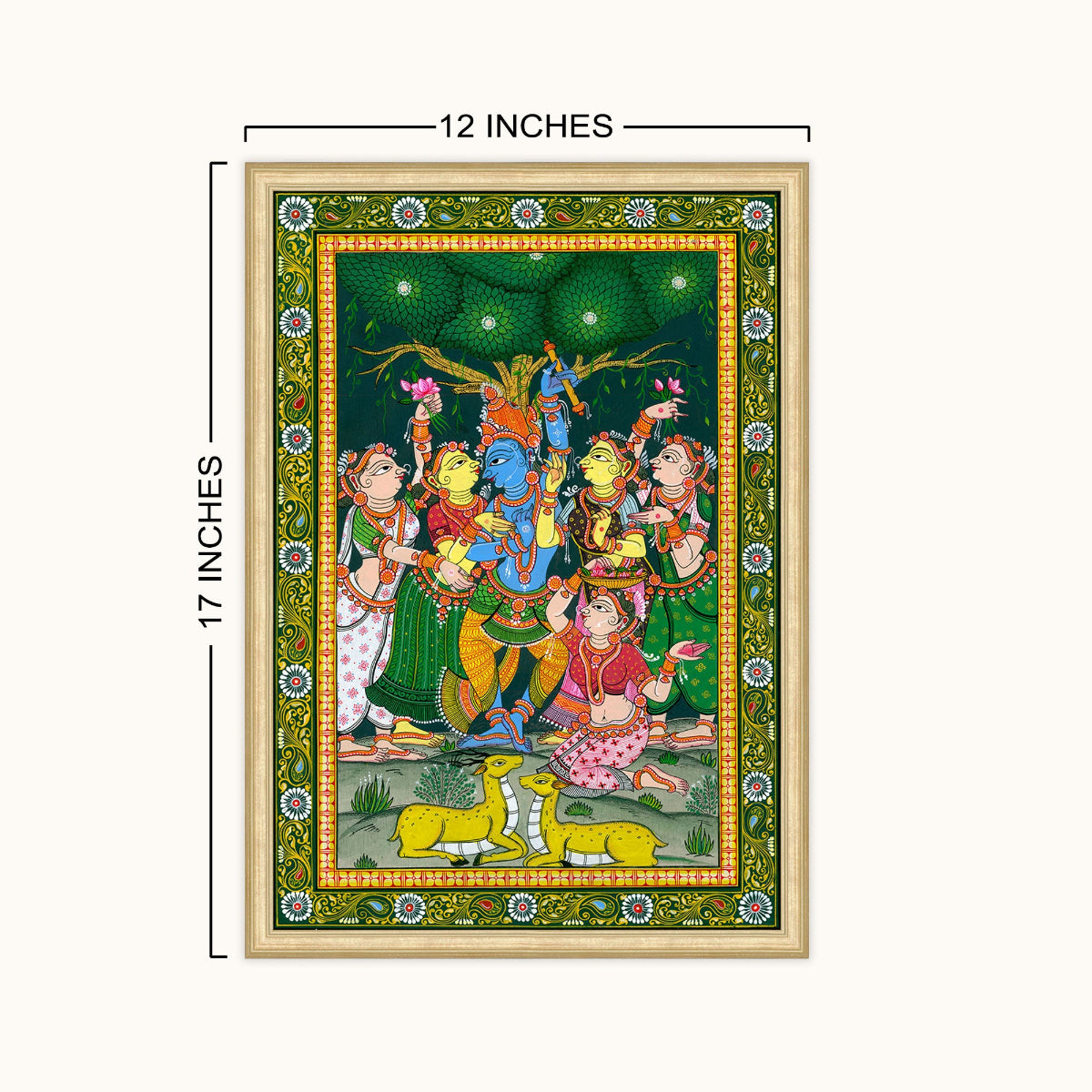 A framed traditional Indian-style art showing several colorful figures under a tree, with dimension markers indicating 12 inches wide by 17 inches tall on a light gray background.