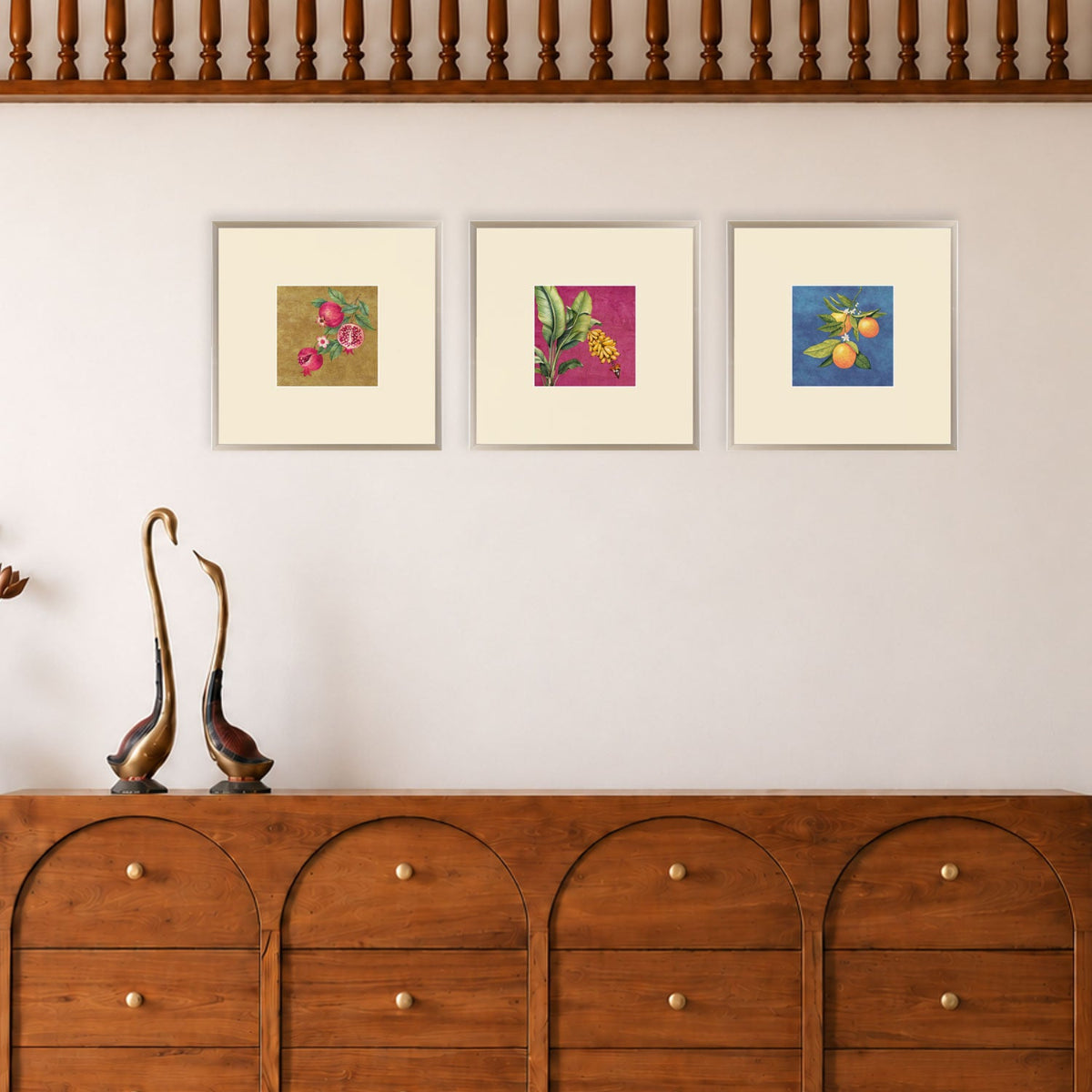 Fruits of Nature set of three framed fruit artworks displayed above a wooden console