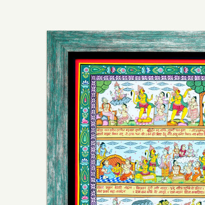 A framed traditional Indian featuring colorful mythological scenes, enclosed in a distressed teal-green wooden frame with a black mat and red inner border, shown against a light off-white background.