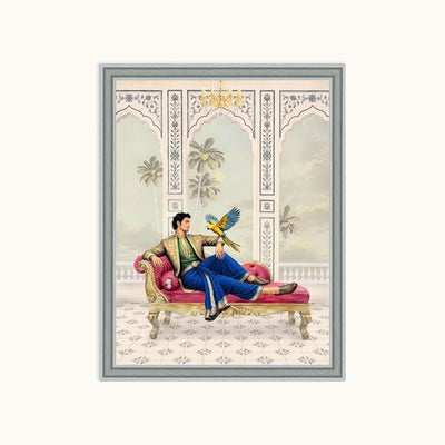 A framed art featuring an illustration of a man lounging on a pink chaise lounge with a parrot, set against an ornate architectural background with palm trees.