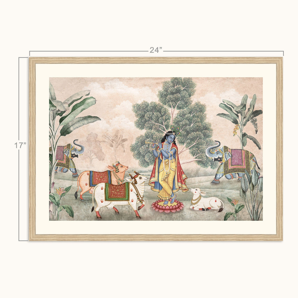 A framed art depicting a traditional Indian scene with a blue-skinned kanha in yellow garments, surrounded by elephants, a white bull, and trees, shown with dimension lines indicating 24 inches wide by 17 inches tall.