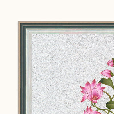 Full view of pink botanical blossoms and green foliage within a layered dark green and silver-toned frame