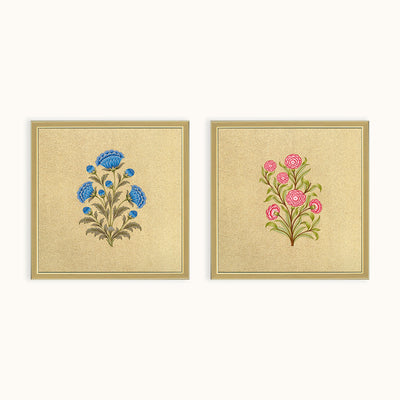 Royal Floral Duo set of two square floral artworks with blue and pink botanical motifs on a golden background