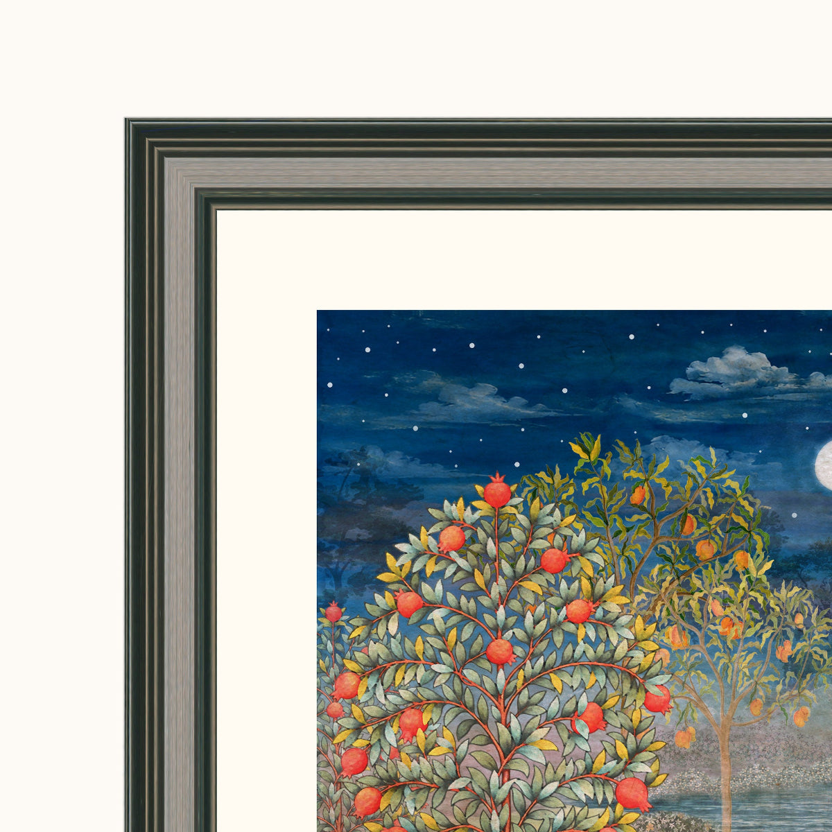 Framed art showing a painted night scene with starry blue sky, clouds, and fruit trees with red-orange fruits, presented in a dark wood frame with white matting.