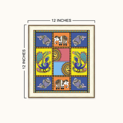 A square framed art featuring a colorful traditional Indian folk art design with peacocks, elephants, and geometric patterns, shown with dimension lines indicating 12 inches by 12 inches on a light beige background.