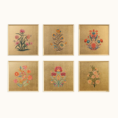 Vasanta Blooms floral wall art set of six displayed above an accent chair
